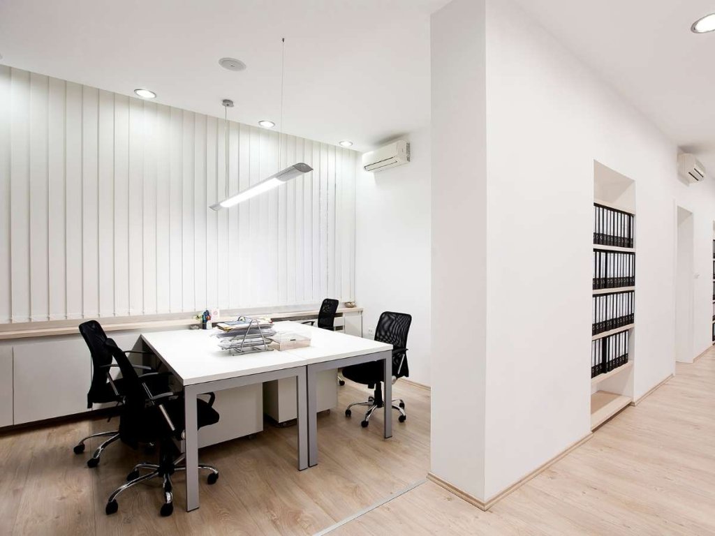 Vertical blinds are another popular choice for office windows